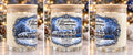 One Sullivan & Roy Christmas Memories candle shown from three angles, with Union Station artwork and bamboo lid.